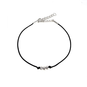 Black string bracelet with 3 silver beads 