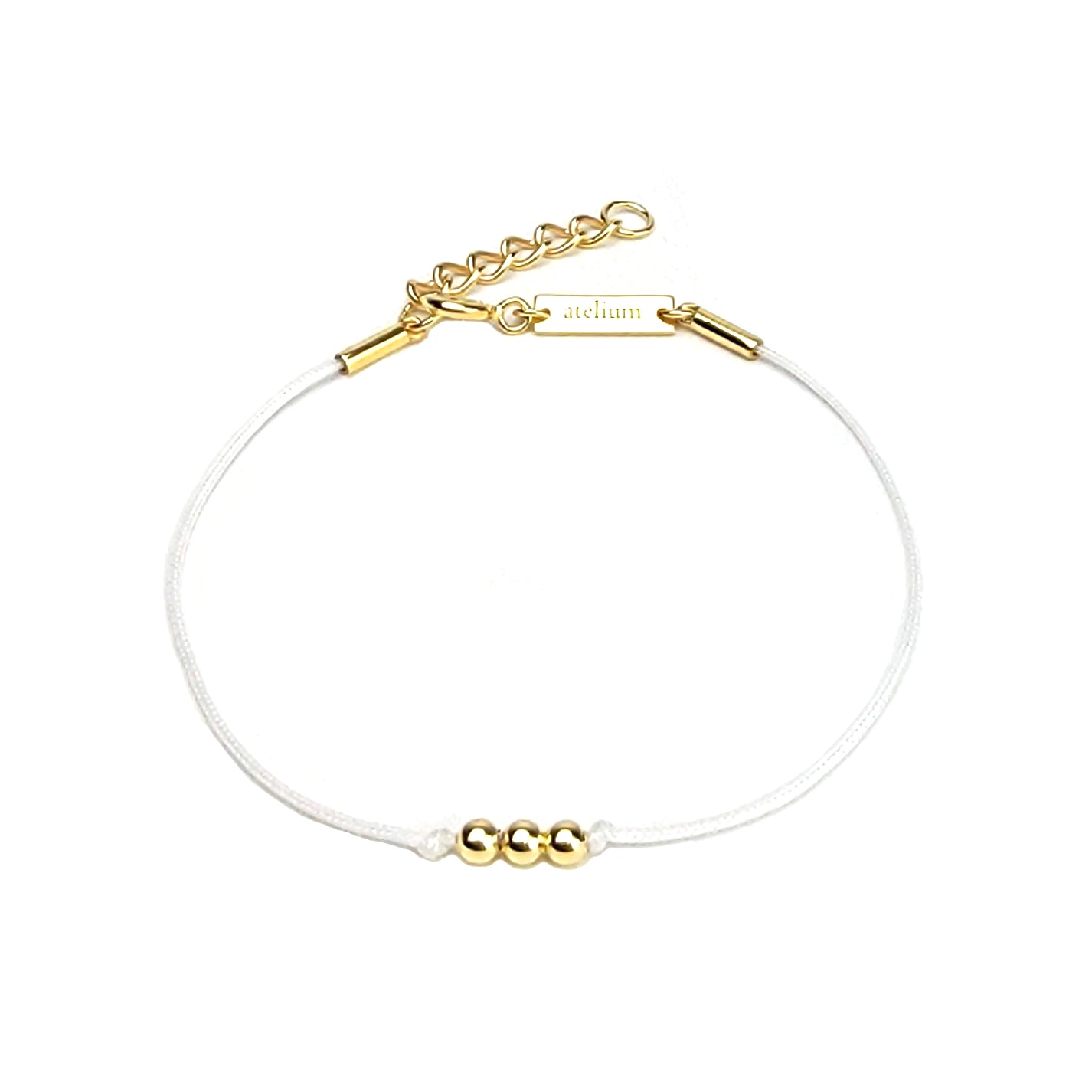 White string bracelet with 3 gold beads