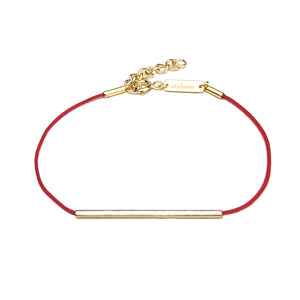 atelium red string bracelet with gold tube 