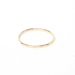 Gold flat ring with hammered groove decorations