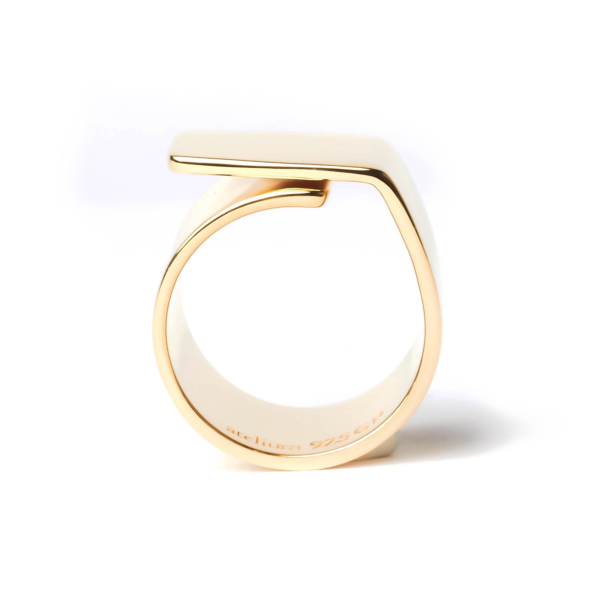 Wide gold ring with overlapping sides top view
