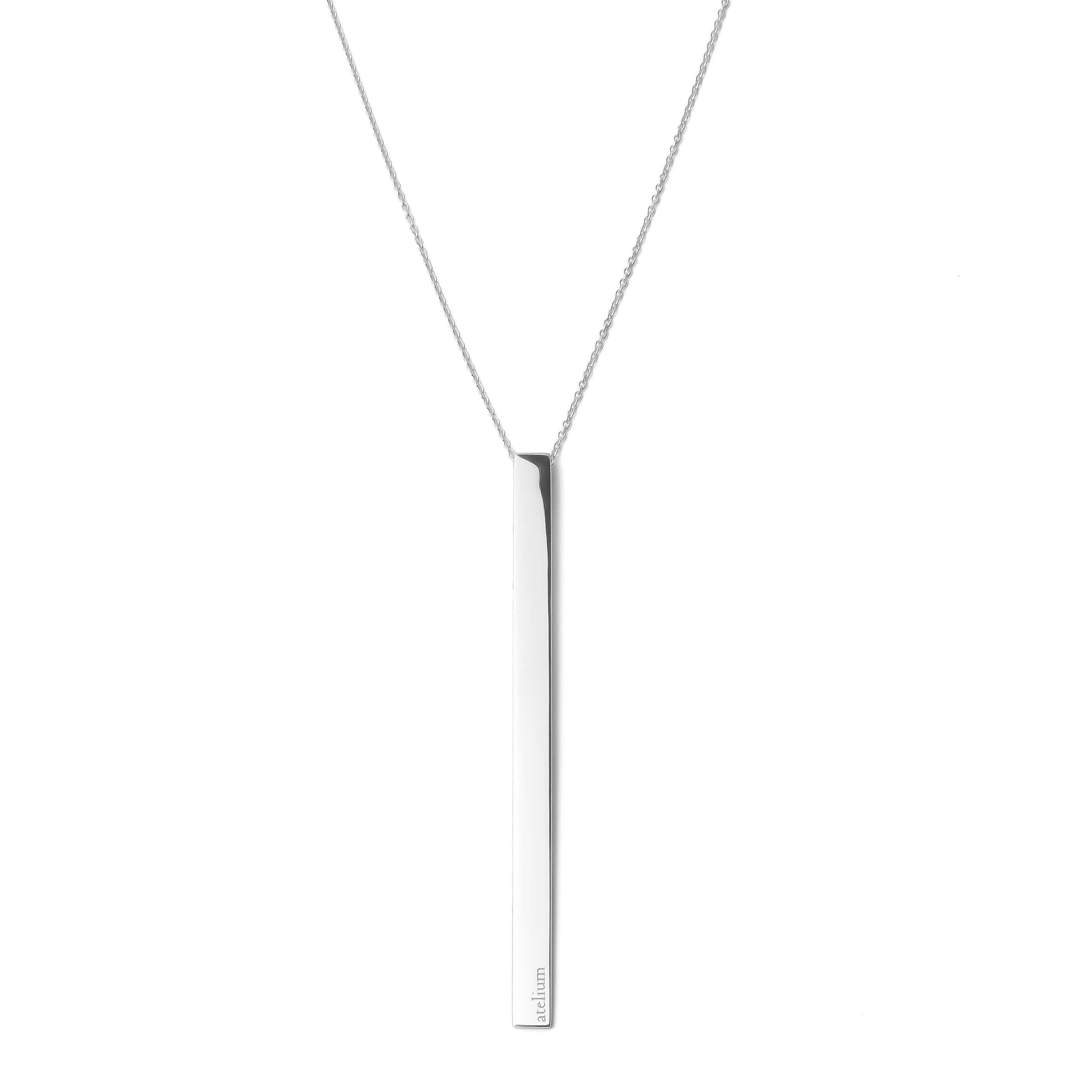 Thin silver necklace with a long bar shaped silver pendant 